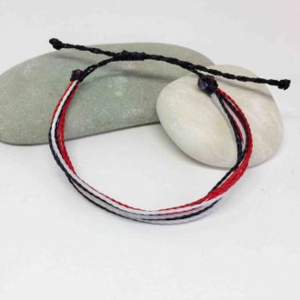 Waterproof and Adjustable Poly Cord Freefoem Red Black And White on Rocks