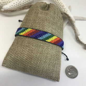 Rainbow-Loom-Bracelet-On-Burlap-Bag