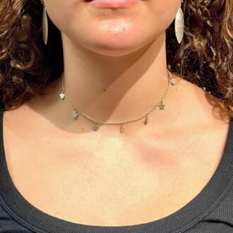 Silver star choker on person